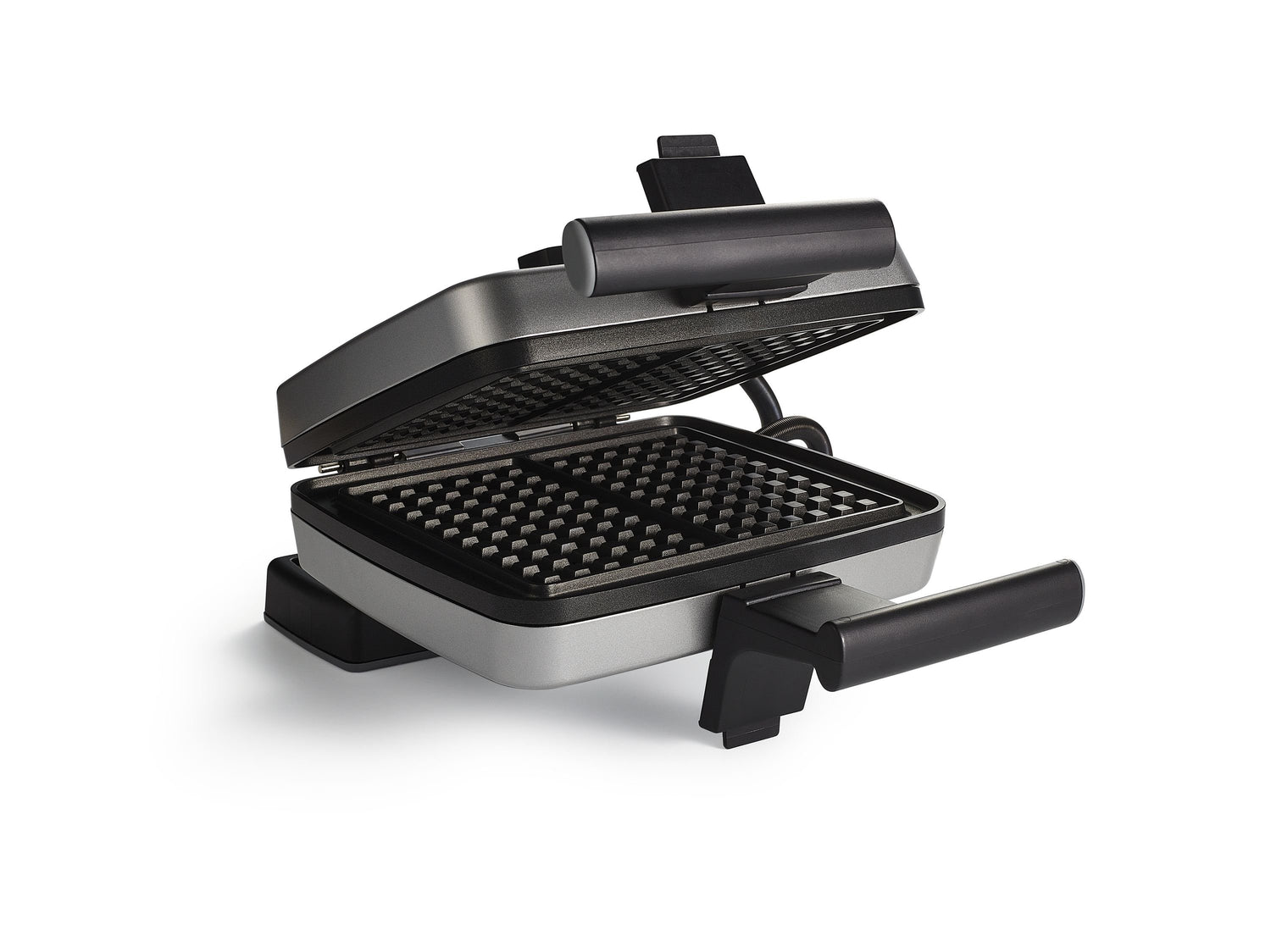Gaufrier ouvert, gris et noir.