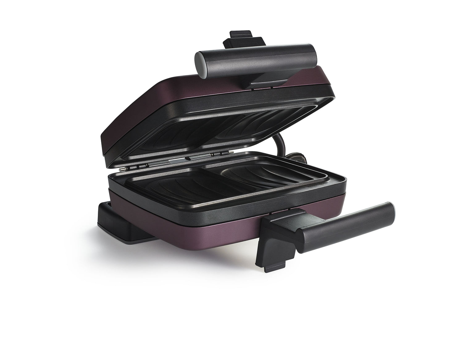 Grill panini violet ouvert.
