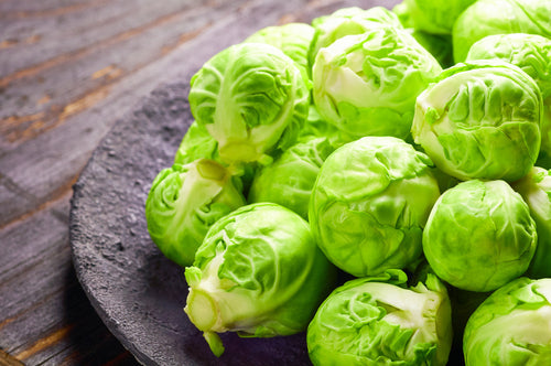 Choux de Bruxelles rôtis au petit lard, sauce au citron et au thym